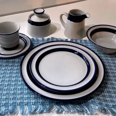 Noritake stoneware with blue trim dishes