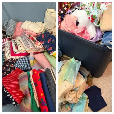 Many yards of fabrics and a big tub of fabric scraps