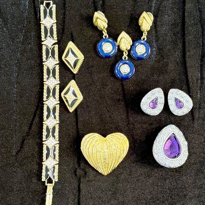 Sale Photo Thumbnail #9: A small sampling of new and vintage costume jewelry.