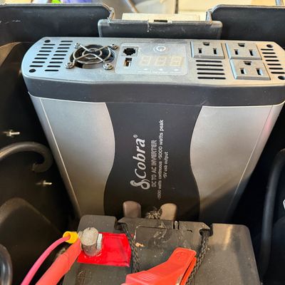 
Cobra Inverter with trickle charger in a wheeled tote. 