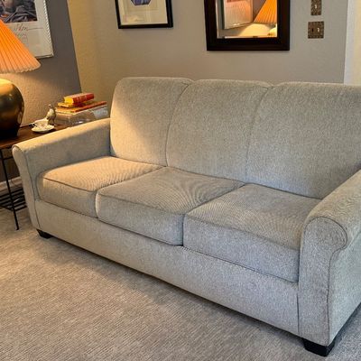 Lovely, low-mileage sleeper sofa with European Mattress Topper.
