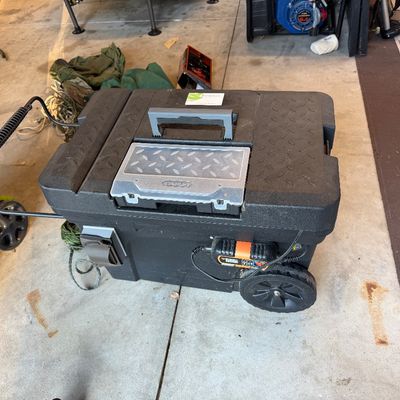 Cobra Inverter with trickle charger in a wheeled tote. 