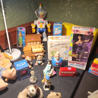 Assortment of vintage toys and collectibles, including a Spice Girls 'On Tour' Victoria doll in box, a toy robot, wooden train...