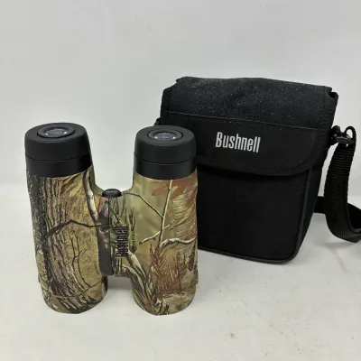 Sale Photo Thumbnail #174: Bushnell PermaFocus 10x42 camouflage binoculars with matching black soft carrying case.