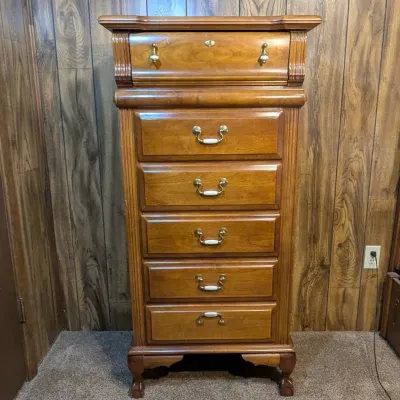 Sale Photo Thumbnail #9: Traditional wooden lingerie chest featuring six drawers, brass and white ceramic hardware, and carved bracket feet.