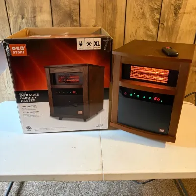 Sale Photo Thumbnail #149: Red Stone portable infrared cabinet heater with wood-look finish, original remote, and retail packaging box.