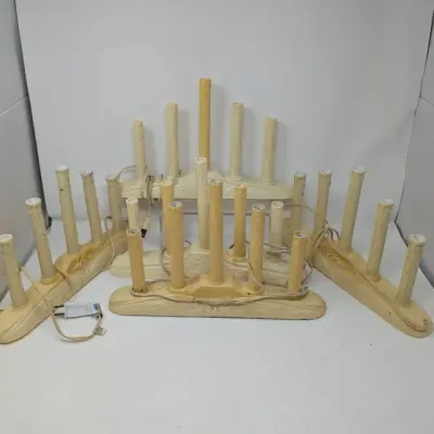 Sale Photo Thumbnail #157: Group of vintage electric Christmas candelabras with faux-drip candle sleeves and molded off-white plastic bases.