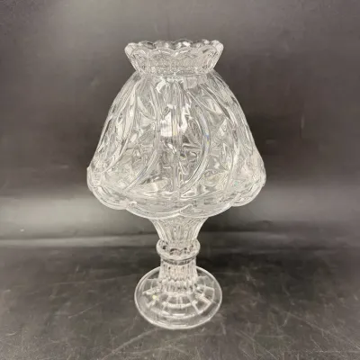 Sale Photo Thumbnail #13: Vintage pressed clear glass fairy lamp with a ruffled top and intricate molded floral patterns.