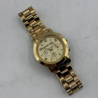 Sale Photo Thumbnail #203: Michael Kors gold-tone chronograph wristwatch featuring a link bracelet, champagne dial with three subdials, and a date display window.
