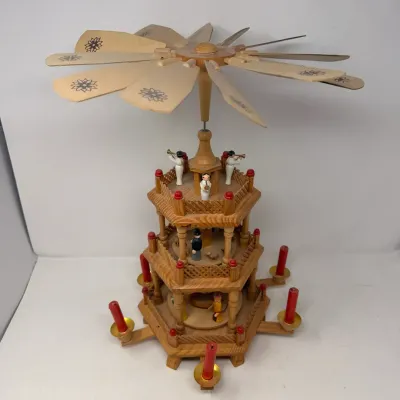 Sale Photo Thumbnail #20: Vintage German wooden Christmas pyramid featuring a three-tier nativity scene and angel musicians, complete with red candles and stenciled top blades.