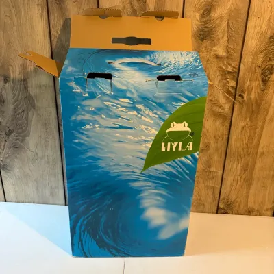 Sale Photo Thumbnail #104: Hyla water vacuum cleaner original cardboard packaging box featuring water graphic and frog logo.