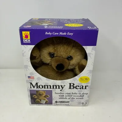 Sale Photo Thumbnail #165: Vintage Dex Products Mommy Bear plush in original packaging, designed to soothe babies with womb sounds.