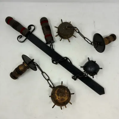 Sale Photo Thumbnail #167: Collection of decorative medieval-style replica weapons, including a sword and three spiked morningstar flails with wooden handles.