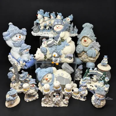Sale Photo Thumbnail #181: Collection of winter and Christmas snowman figurines and home decor pieces, featuring light blue and white textured resin accents.