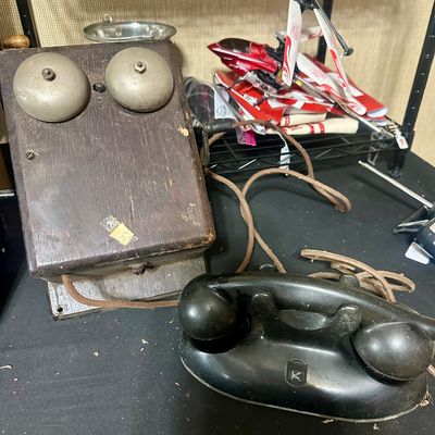 Sale Photo Thumbnail #68: Antique wooden ringer box telephone with dual brass gongs and crank, paired with a black Kellogg handset base.