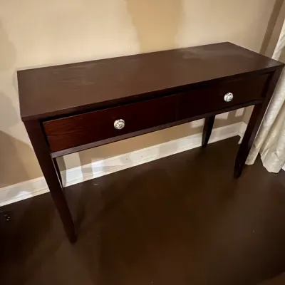Sale Photo Thumbnail #31: Dark espresso-stained wooden console table with two drawers featuring decorative ceramic knobs.