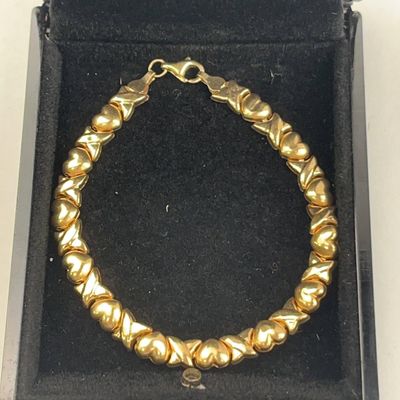 Sale Photo Thumbnail #437: 10K Gold Hugs & Kisses Bracelet 1991