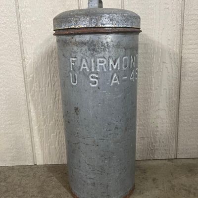 Sale Photo Thumbnail #70: Isalys & Fairmont Steel Dairy Can