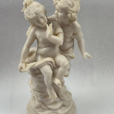 Sale Photo Thumbnail #177: Neoclassical Bonded Stone Cherubs Lot