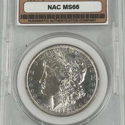 Sale Photo Thumbnail #268: US 1884-O Morgan Silver Dollar MS66 NAC