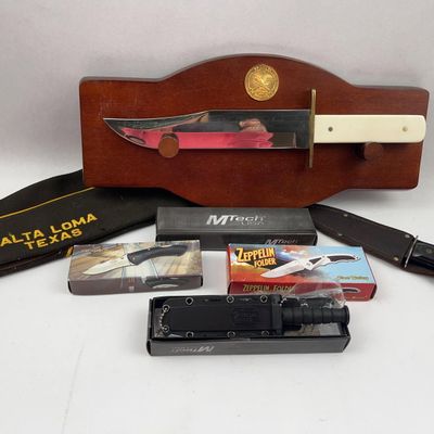 Sale Photo Thumbnail #450: V.F.W. Cap & Tactical Knife Collection