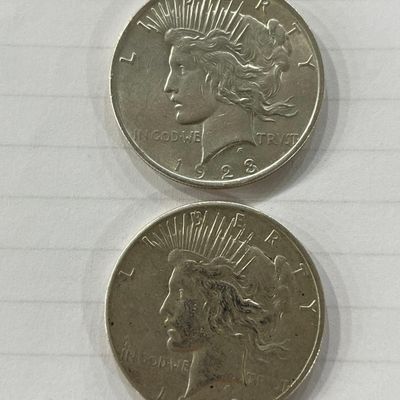 Sale Photo Thumbnail #118: Pair 1928 Peace Silver Dollars