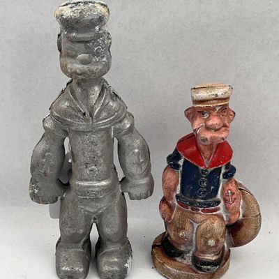 Sale Photo Thumbnail #172: Pair Popeye Cast Iron Still Banks