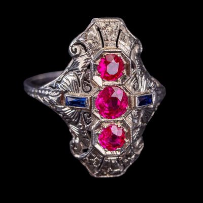 Sale Photo Thumbnail #631: 18K Art Deco Filigree Cocktail Ring With Rubies