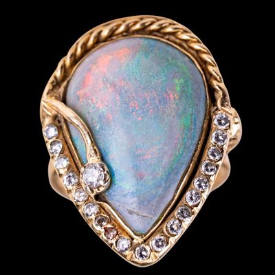 Sale Photo Thumbnail #641: 14K Yellow Gold Mid-Century Opal Cocktail Ring