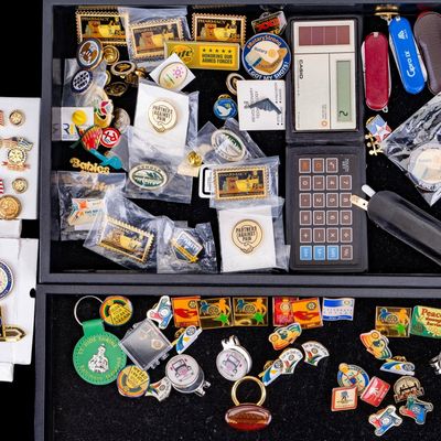 Sale Photo Thumbnail #475: Lapel Pins, Calculators, and Keychains