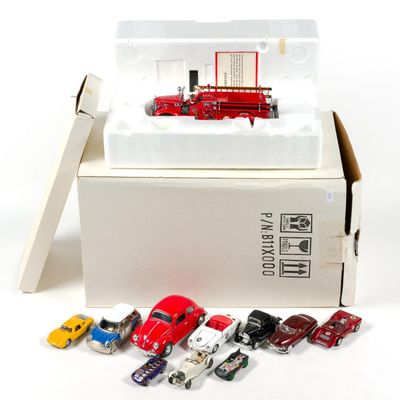 Sale Photo Thumbnail #97: Franklin Mint Christmas Fire Engine with COA and Toy Cars