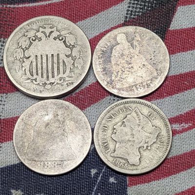 1865 Three Cent Nickel, 1875 Seated Liberty 90% Silver Dime, 1887 Seated Liberty 90% Silver Dime and No Date Shield Nickel w/ Rays