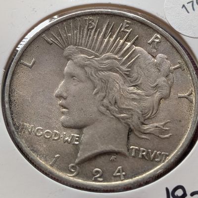 Sale Photo Thumbnail #82: 1924 Peace 90% Silver Dollar