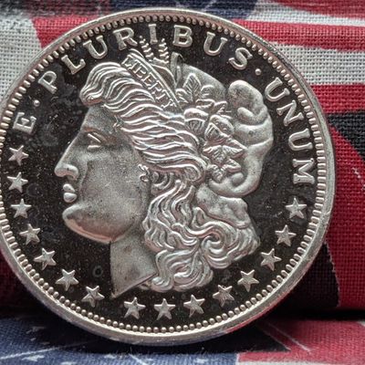 Sale Photo Thumbnail #210: One Troy Oz. .999 Fine Silver Morgan Head Design Round