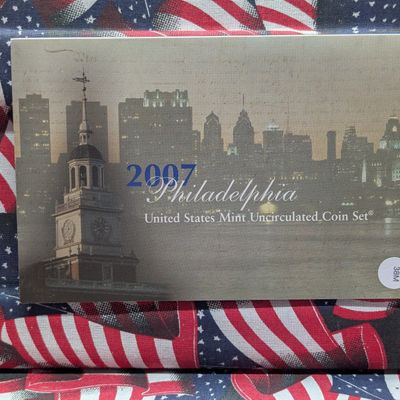 Sale Photo Thumbnail #191: 2007-P Only U.S. Mint Uncirculated Coin Set With Presidential Dollars, Sacagawea Dollar, and State Quarters In OGP w/ COA