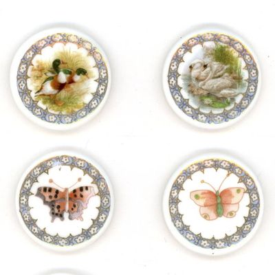 Sale Photo Thumbnail #103: A SMALL CARD OF DIVISION THREE ENGLISH CERAMIC BUTTONS