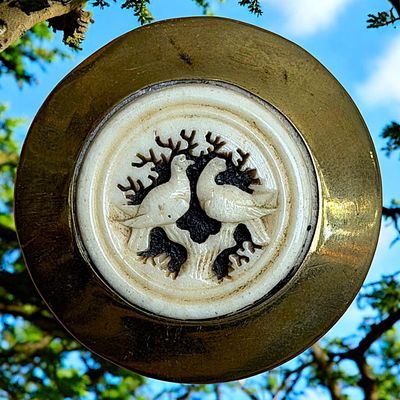 Sale Photo Thumbnail #73: A DIVISION ONE CARVED ANIMAL SET IN METAL BUTTON