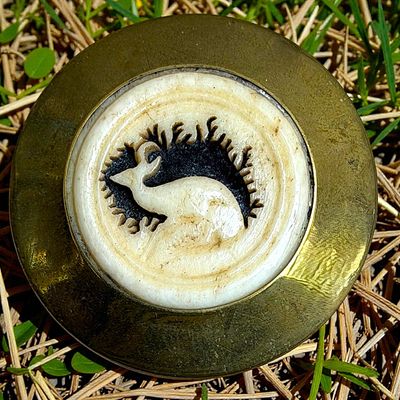 Sale Photo Thumbnail #74: A DIVISION ONE CARVED ANIMAL SET IN METAL BUTTON