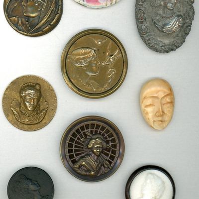 Sale Photo Thumbnail #427: A SMALL CARD OF DIVISION 1 & 3 FEMALE HEAD BUTTONS