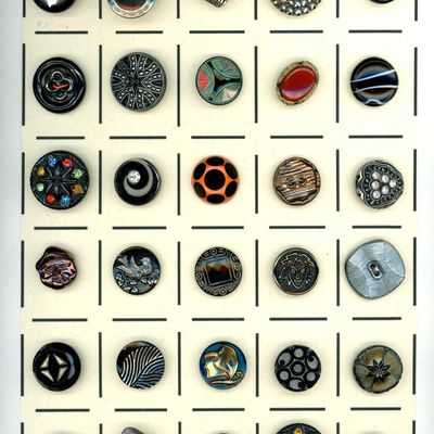 Sale Photo Thumbnail #334: A CARD OF DIVISION THREE ASSORTED BLACK GLASS BUTTONS