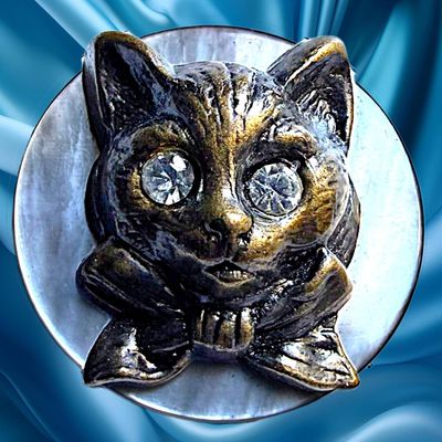 Sale Photo Thumbnail #58: A DIVISION ONE PEARL AND BRASS ANIMAL BUTTON
