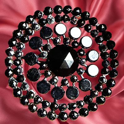Sale Photo Thumbnail #331: A DIVISION ONE PIERCED RIVETED BLACK GLASS BUTTON