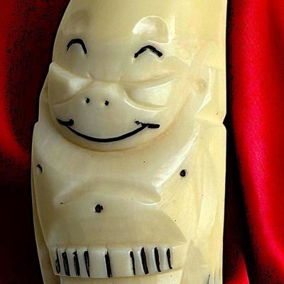 Sale Photo Thumbnail #75: A DIVISION THREE CARVED BILLIKEN