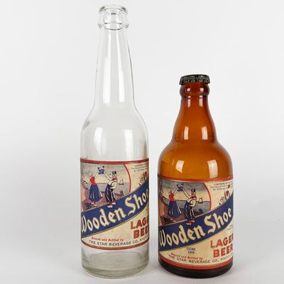 Sale Photo Thumbnail #439: Two Wooden Shoe Lager Beer Labeled Bottles MINSTER OHIO