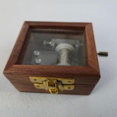 Sale Photo Thumbnail #38: Wooden Hand-Crank Music Box With Glass Viewing Lid – Sankyo Musical Movement