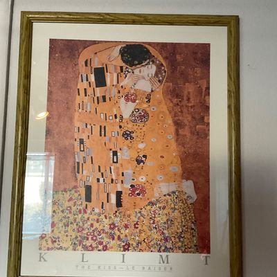 Sale Photo Thumbnail #79: Framed  poster Gustav Klimt's "The Kiss" ("Le Baiser") in a gold-finished wood frame.