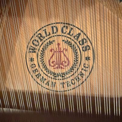 Sale Photo Thumbnail #7: Stunning Story & Clark Prelude baby grand piano has a polished mahogany wood finish. This instrument is a Prelude model with a matching padded bench. The piano has a high-gloss exterior and brass hardware.
Approx 5x5 feet. 
Buyer pays moving costs.