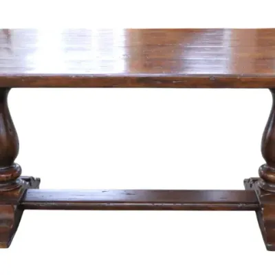 Sale Photo Thumbnail #26: Theodore Alexander Rustic dark wood trestle dining table featuring turned pedestal supports and a floor stretcher.