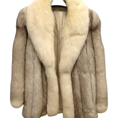Sale Photo Thumbnail #72: Vintage mid-length fur coat featuring a plush cream-colored fox fur shawl collar and two-tone beige body.