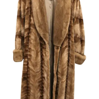 Sale Photo Thumbnail #73: Vintage full-length honey brown mink fur coat featuring a plush shawl collar and folded cuffs.